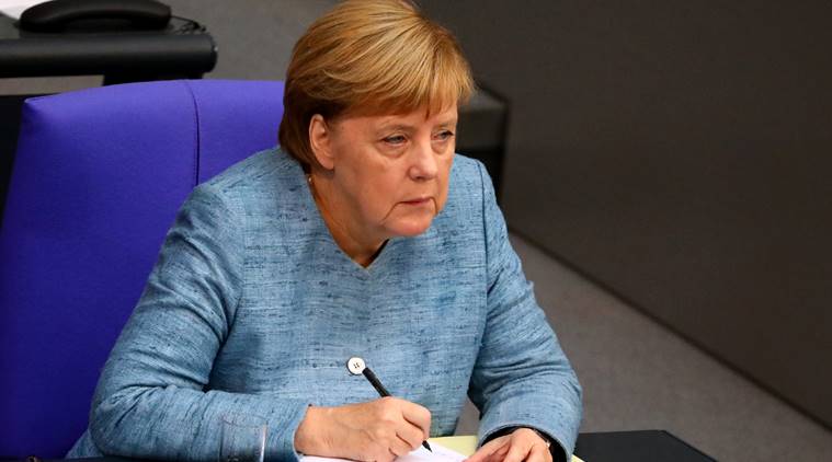 Angela Merkel says stepping down as German Chancellor will not weaken her on world stage